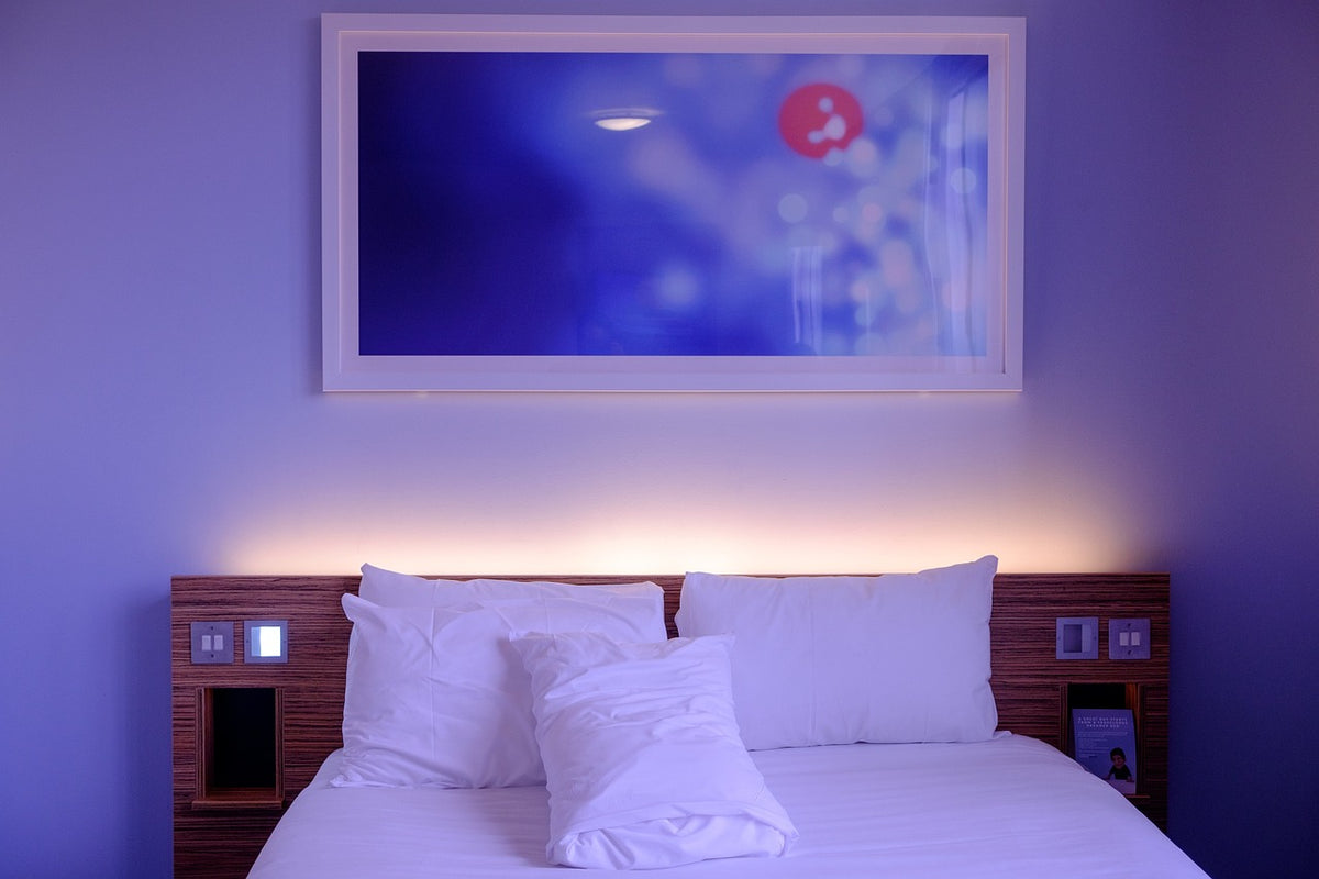 Luxury white hotel bedroom with premium bedding — best luxury mattress Singapore | Snow Slumber
